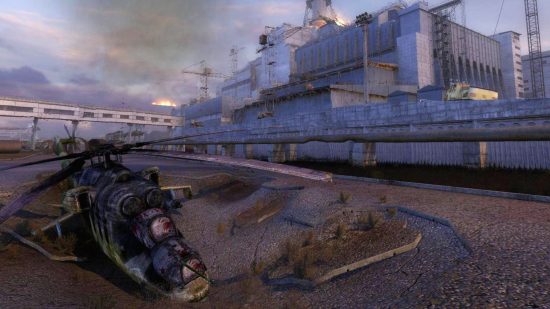 Best apocalypse games - STALKER: A crashed helicopter lays on the ground in front of a ship