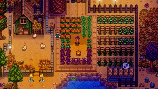 An autumnal looking farm, complete with pumpkins, in Stardew Valley, one of the best crafting games