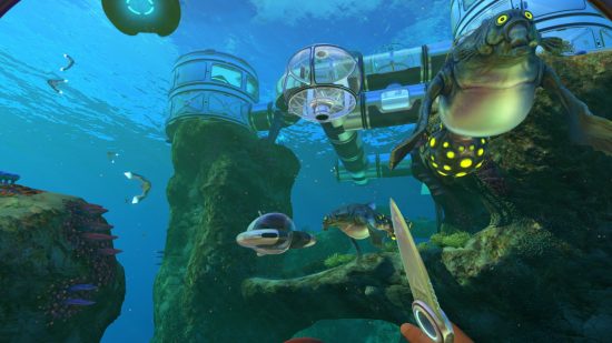 Swimming towards an underground base surrounded by blue ocean and underwater creatures in Subnautica