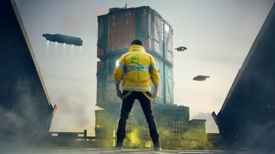 Best cyberpunk games - Cyberpunk 2077: A protagonist in a yello bomber jacket stands with his back to you, flying vehicles around him and a skyscraper in front