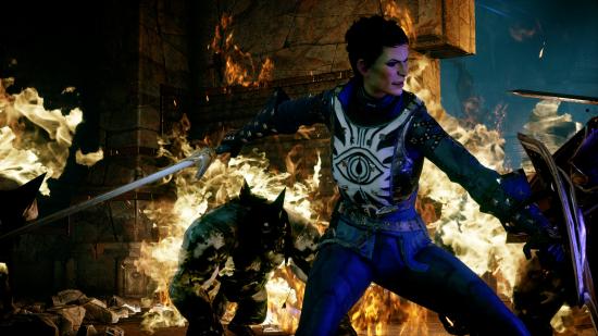 A warrior fights werewolves in a flaming keep in Dragon Age: Inquisition