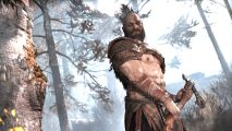 Kratos prepares to chop down a tree in God of War PC