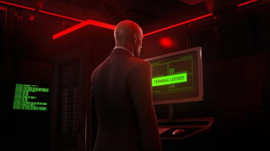 Agent 47 staring coldly at a monitor after being locked out of a terminal