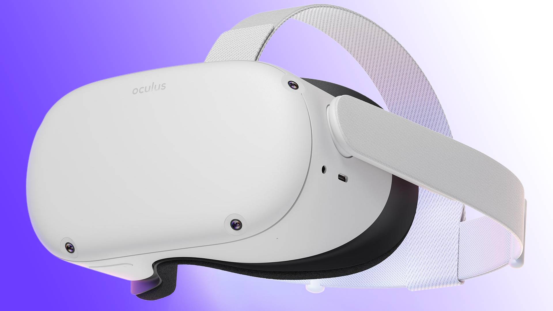 The Oculus Quest 2 VR headset looks to the left against a blue and white background