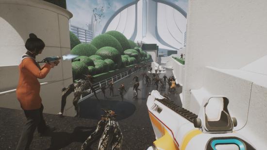 Two players face off against a swarm of aliens on a brightly-lit promenade on The Anacrusis.