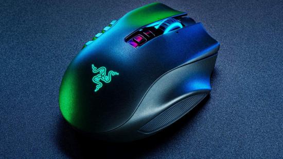 The Razer Naga wireless gaming mouse sitting on a fabric surface.
