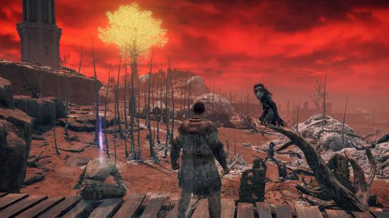 Elden Ring open world: looking out across the scarlet rotted wasteland that is Caelid