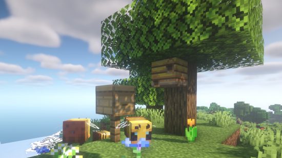 Sådan får du bier i Minecraft: Omgiv et bi -rede og en bikube nær et egetræ og blomster
