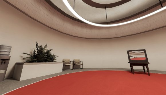 A round room with a red carpet holds a television set that displays a view of the same room in The Stanley Parable: Ultra Deluxe.
