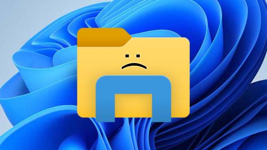 Windows file explorer ads: Windows folder icon with sad face with default wallpaper backdrop