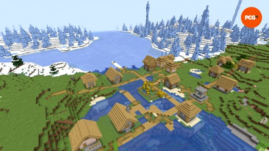 A plains village overlooking an ice spikes biomes in one of the best Minecraft Christmas seeds.