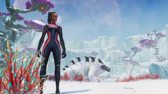 Subnautica 3確認：ウェットスーツの女性は、背景に生き物がある氷のような表面に立っています