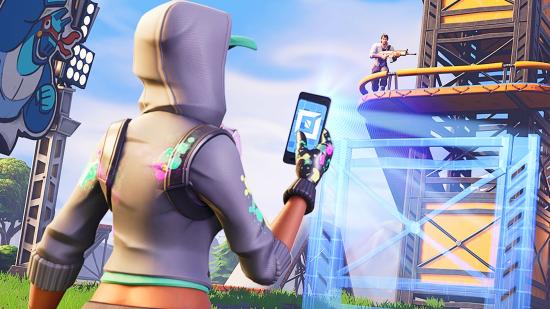 uTure Ali-A: a Fortnite player takes a picture of a structure with their phone