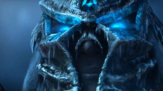 The Lich King's eyes glow blue from under his frozen iron helmet in the cinematic trailer for World of Warcraft's Wrath of the Lich King Classic expansion.