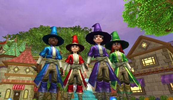 Los mejores juegos gratuitos para PC: Wizard101. La imagen muestra a un grupo de magos parados en un patio. Todos tienen túnicas de diferentes colores.