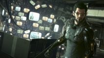 Adam Jensen scowls as he stands in front of a complex display of old CRT monitors wired to the ceiling, displaying his arm-mounted blades. A new Deus Ex game may be in the works following Embracer's acquisition of Eidos-Montreal and several other former Square Enix studios.