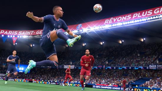 A player in blue leaps toward the ball during a football match in FIFA 22, which going forward will be called EA Sports FC.