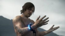 Norman Reedus stands naked on a beach in Death Stranding, looking at his hands as they rapidly age. Norman Reedus recently told LEO that Death Stranding 2 is in production.