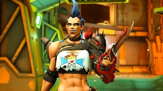 The hero of Overwatch 2 is Junker Queen, a sassy, ​​muscular Aussie with a tall blue mohawk and a tattered crop top, grinning as she brandishes her signature knife.