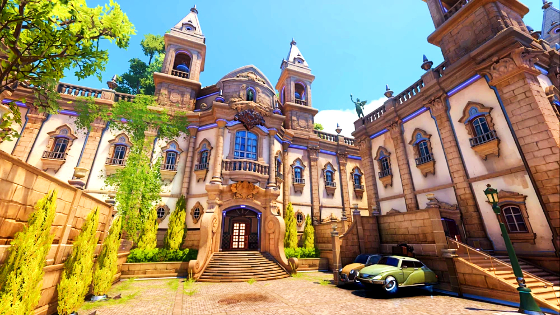Overwatch 2 Esperança map - large white and gold mansion with cars parked outside