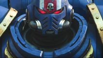 An Ultramarine helmet with glowing red eyes is seen in the trailer for Warhammer 40,000: Space Marine 2, which will be featured during this year's Warhammer Skulls stream June 1