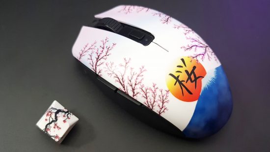 The best wireless gaming mouse for travel, the Razer Orochi V2, has a custom shell featuring pink cherry blossom on white