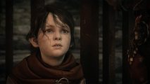 Hugo, one of the protagonists from A Plague Tale: Requiem stares wide eyed