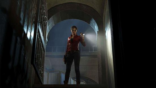 Resident Evil 2 system requirements: Claire Redfield stares down a staircase, flashlight in hand