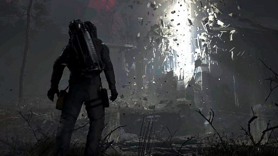 STALKER 2 trailer: A figure clad in a form-fitting chemical suit approaches a brightly glowing anomaly that appears to be suspending fragments of an exploded building in the air
