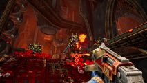 Warhammer 40k: Boltgun reveal trailer: Three chaos space marines in black and gold armour approach at the top of a ramp in a massive factory, the characters are rendered in pixelated '90s art style.