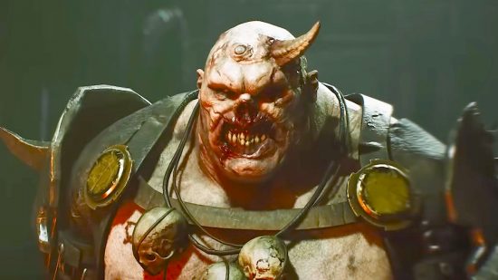 Warhammer 40K Darktide trailer screenshot with Orc in centre