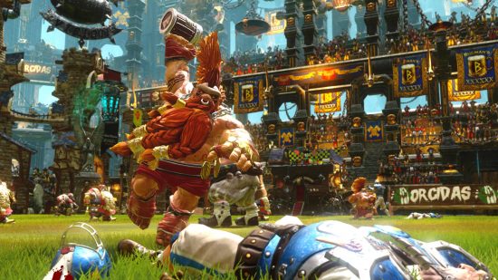Best Warhammer games - a dwarf is about to slam a tankard into the balls of a fallen human football player in Blood Bowl 2. The crowd behind him is cheering him on.