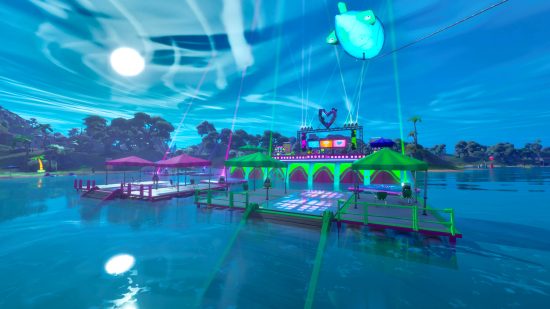 Fortnite dance floor locations: three neon-coloured dance floors floating in the ocean with a big dance floor in the centre. A fish is above them all, basking in the moonlight.
