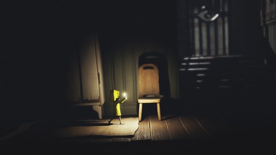 Best horror games: Using a lantern to explore a level in Little Nightmares