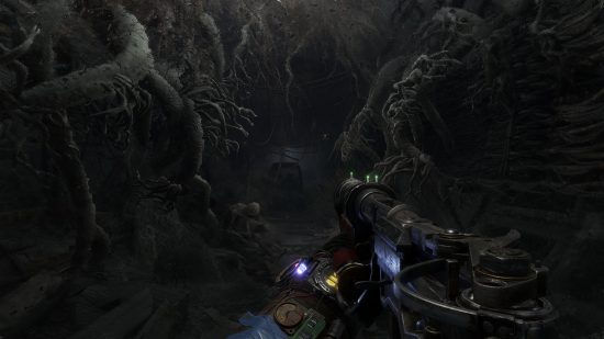 Best horror games: trudging through a frozen, drak tunnel in Metro Exodus