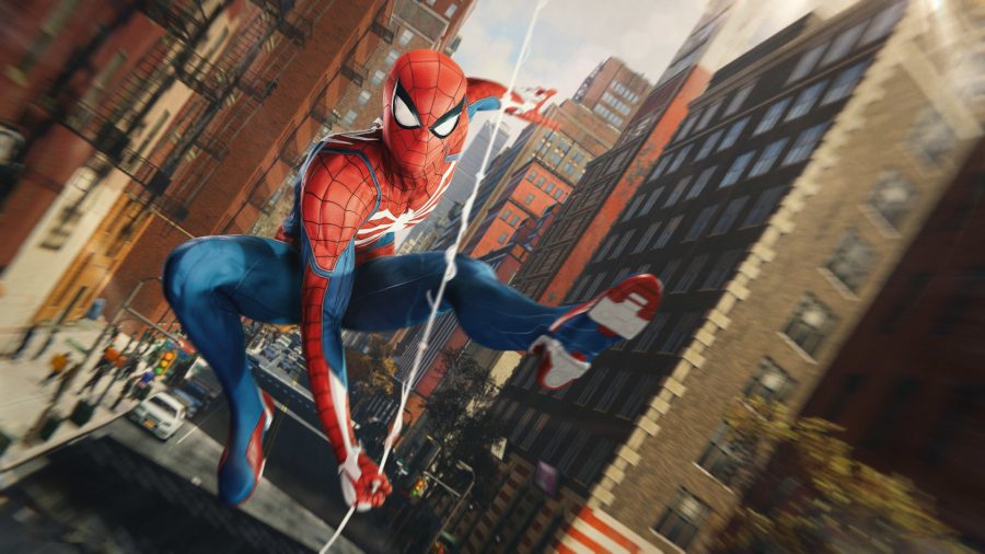 Marvel's Spider-Man Remastered PC: Spider-Man swings through the streets of New York City, glazed in sunlight