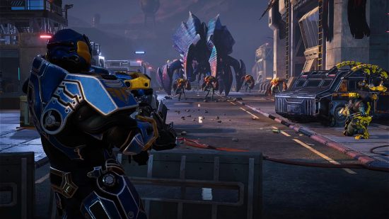 Phoenix Point Steam Workshop support: An armoured soldier fires a massive laser machine gun at a huge four-legged alien creature approaching in the distance on a ruined city street
