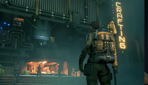 The Cycle; Frontier update 1.3.8: A mercenary in yellow, wearing a large backpack, stands facing a crafting station marked by a vertical yellow neon sign