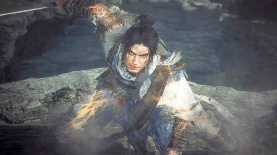 The Witcher and Sekiro meet in Team Ninja's Wo Long: Fallen Dynasty: Man faces the camera in a crouched stance holding a sword