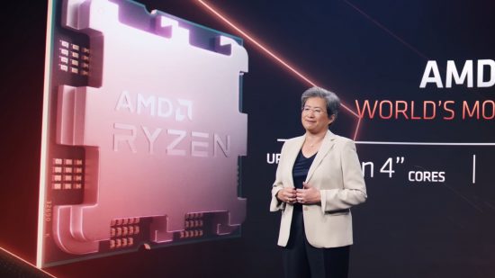 AMD CEO Dr Lisa Su (right) stands next to a large Ryzen 7000 CPU (left)