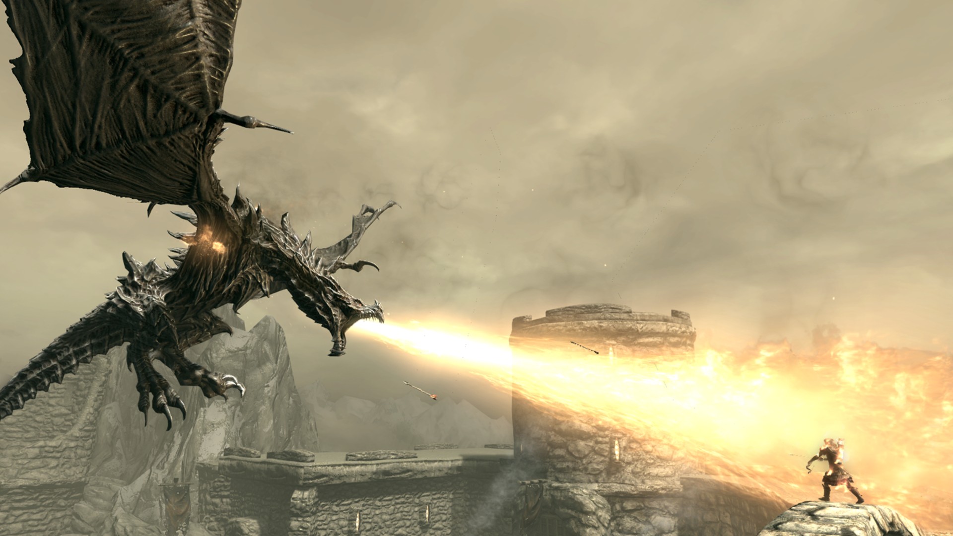 Best dragon games: Skyrim. Image shows a dragon breathing fire on somebody.