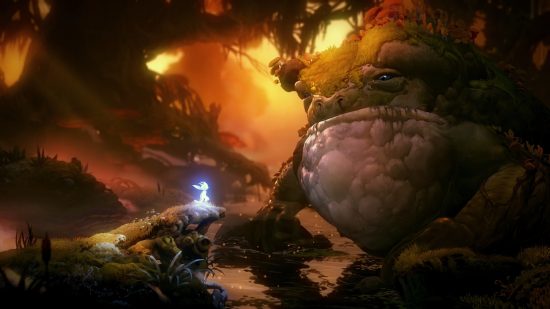 Best platform games: Ori stands on a mossy rock in a swamp, facing a large, earth-covered toad in Ori and the Will of the Wisps.