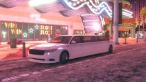 Best Saints Row cars vehicles: a white limonene parked outside a Las Vegas-themed Casino in Santo Ileso.