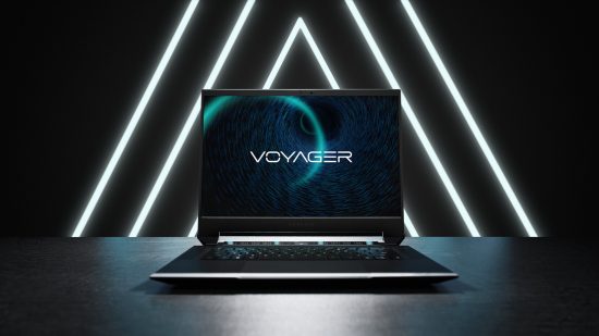 The Corsair Voyager a1600 gaming laptop, sitting on a metallic desk, with rows of lights behind it