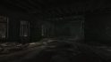 Escape from Tarkov screenshots: A large open room in a dark, abandoned residential building. debris and pools of water cover the floor and the window panes have all been broken