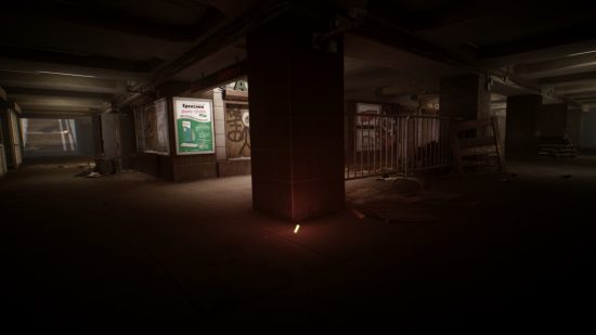 Escape from Tarkov screenshots: The concourse of a city subway, lit by an amber flare