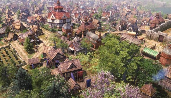 City builder Farthest Frontier Early Access: A bird's eye view of a lively medieval town in the springtime