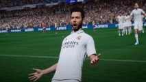 FIFA 23 career mode guide: the player celebrating after scoring for Real Madrid