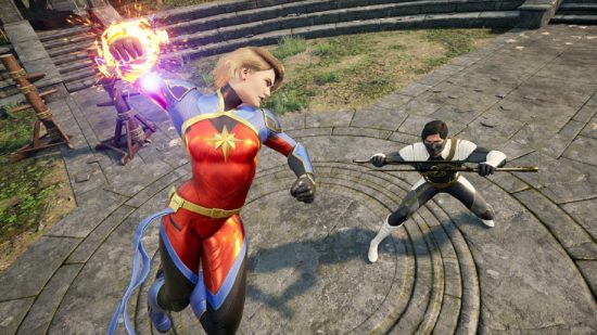 Marvel's Midnight Suns release date: Captain MArvel spars with her teammate. She is mid-air, fist aflame, ready to throw a punch
