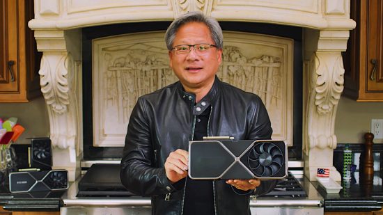 Nvidia CEO Jensen Huang holds a GeForce graphics card in his hand, as he may an Nvidia RTX 4000 graphics card in the near future